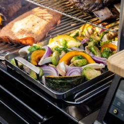 Traeger ModiFIRE Fish & Veggie Stainless Steel Grill Tray 7 Traeger ModiFIRE Fish & Veggie Stainless Steel Grill Tray -BBQ Kingdom BAC610 Fish and Veggie Tray Lifestyle 003 WEB 1000x1000 e8309f7 27330.1670584758